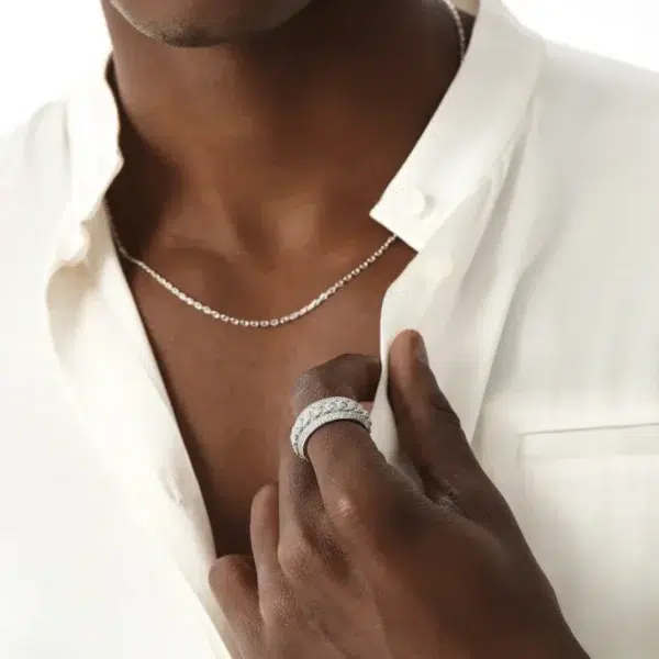 Silver Cuban spinner ring and micro cable chain styled with white shirt