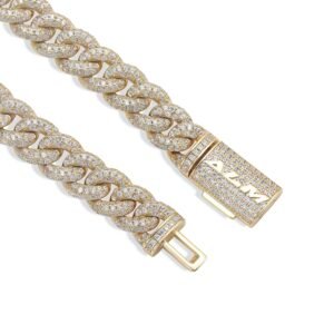 Gold diamond-encrusted Cuban link bracelet clasp detail with custom security mechanism