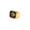 Gold-plated square signet ring with black enamel and ghost motif shown face-forward on white background