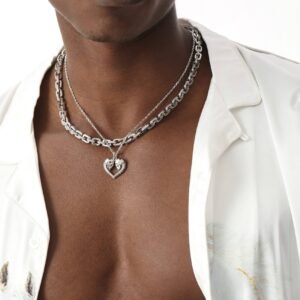 Silver skull heart pendant and diamond gridlock chain styled with white shirt Filename: skull-heart-gridlock-styling