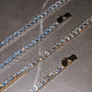 Sterling silver tennis necklaces in yellow gold and rhodium plating with branded clasps