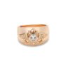 Champagne gold ring featuring twin eagle design with central cubic zirconia stone